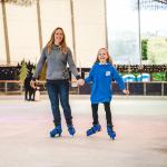Mum and daughter ice skating